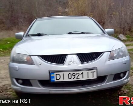 Серый Мицубиси Лансер, объемом двигателя 2 л и пробегом 352 тыс. км за 3950 $, фото 1 на Automoto.ua