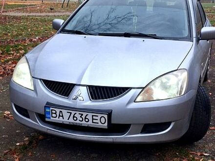 Сірий Міцубісі Lancer, об'ємом двигуна 1.6 л та пробігом 213 тис. км за 4400 $, фото 1 на Automoto.ua