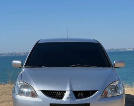 Сірий Міцубісі Lancer, об'ємом двигуна 1.6 л та пробігом 467 тис. км за 4100 $, фото 1 на Automoto.ua