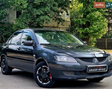 Сірий Міцубісі Lancer, об'ємом двигуна 1.59 л та пробігом 223 тис. км за 3799 $, фото 1 на Automoto.ua