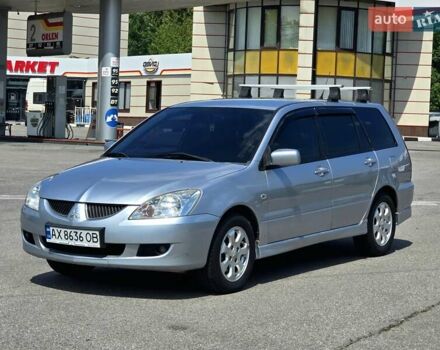 Сірий Міцубісі Lancer, об'ємом двигуна 1.58 л та пробігом 246 тис. км за 4300 $, фото 1 на Automoto.ua