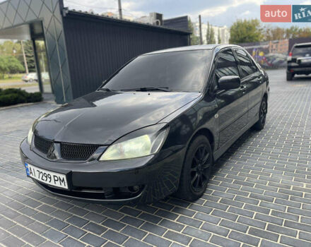 Сірий Міцубісі Lancer, об'ємом двигуна 1.6 л та пробігом 250 тис. км за 3300 $, фото 1 на Automoto.ua
