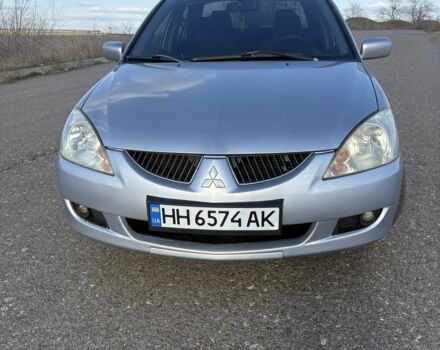 Серый Мицубиси Лансер, объемом двигателя 1.6 л и пробегом 260 тыс. км за 4100 $, фото 1 на Automoto.ua