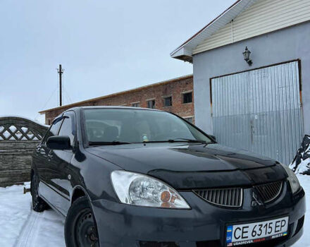 Серый Мицубиси Лансер, объемом двигателя 1.58 л и пробегом 222 тыс. км за 2750 $, фото 1 на Automoto.ua