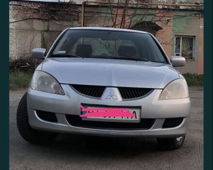 Серый Мицубиси Лансер, объемом двигателя 0 л и пробегом 165 тыс. км за 3207 $, фото 1 на Automoto.ua