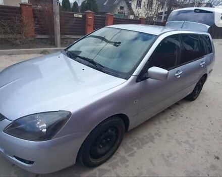 Серый Мицубиси Лансер, объемом двигателя 2 л и пробегом 345 тыс. км за 3500 $, фото 1 на Automoto.ua