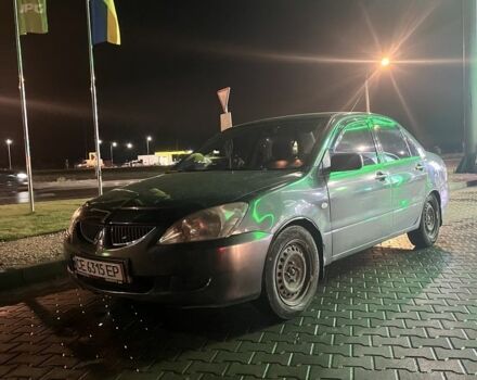 Серый Мицубиси Лансер, объемом двигателя 1.6 л и пробегом 269 тыс. км за 2999 $, фото 1 на Automoto.ua