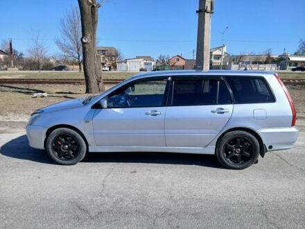 Сірий Міцубісі Lancer, об'ємом двигуна 1.6 л та пробігом 291 тис. км за 3700 $, фото 1 на Automoto.ua