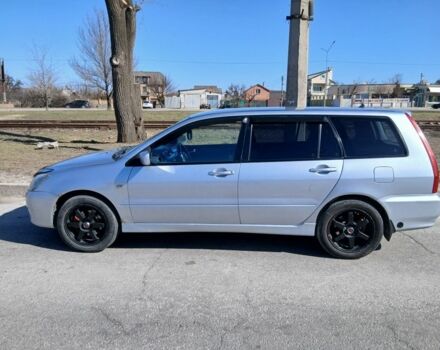 Серый Мицубиси Лансер, объемом двигателя 1.6 л и пробегом 291 тыс. км за 3700 $, фото 1 на Automoto.ua