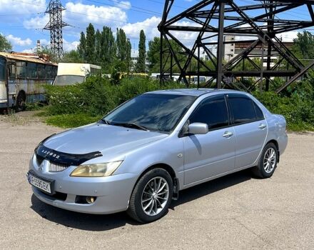 Сірий Міцубісі Lancer, об'ємом двигуна 1.6 л та пробігом 235 тис. км за 3950 $, фото 1 на Automoto.ua