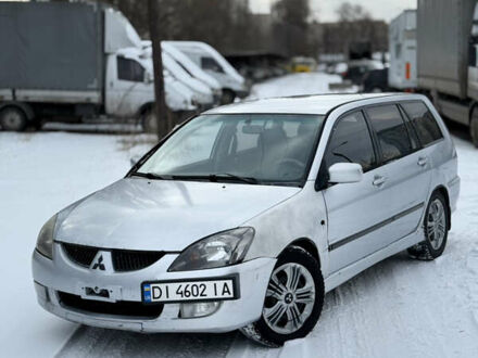 Сірий Міцубісі Lancer, об'ємом двигуна 2 л та пробігом 322 тис. км за 3300 $, фото 1 на Automoto.ua