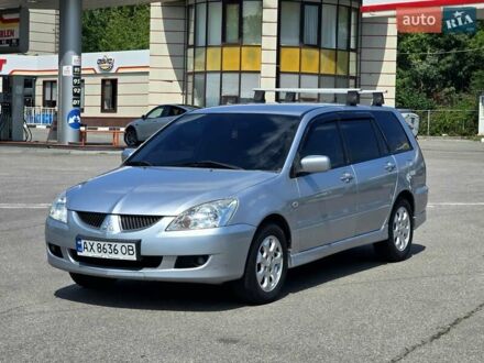 Сірий Міцубісі Lancer, об'ємом двигуна 1.58 л та пробігом 246 тис. км за 4200 $, фото 1 на Automoto.ua