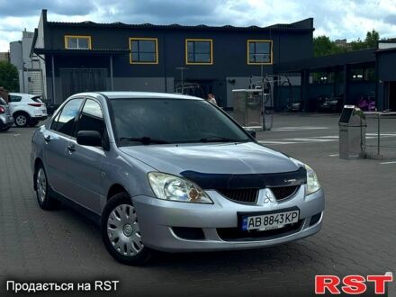 Сірий Міцубісі Lancer, об'ємом двигуна 1.6 л та пробігом 300 тис. км за 3199 $, фото 1 на Automoto.ua