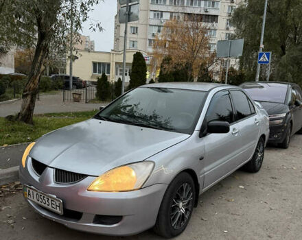Серый Мицубиси Лансер, объемом двигателя 1.58 л и пробегом 299 тыс. км за 3850 $, фото 1 на Automoto.ua