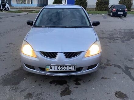 Мицубиси Лансер 2003 в Белой Церкве на Automoto.ua Серый Мицубиси Лансер, объемом двигателя 1.58 л и пробегом 350 тыс. км за 3300 $, фото 1 на Automoto.ua