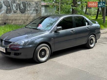 Мицубиси Лансер 2003 в Киеве на Automoto.ua Серый Мицубиси Лансер, объемом двигателя 1.6 л и пробегом 272 тыс. км за 5100 $, фото 1 на Automoto.ua