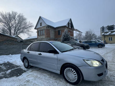 Сірий Міцубісі Lancer, об'ємом двигуна 1.58 л та пробігом 444 тис. км за 3000 $, фото 1 на Automoto.ua