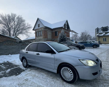 Сірий Міцубісі Lancer, об'ємом двигуна 1.58 л та пробігом 444 тис. км за 3000 $, фото 1 на Automoto.ua