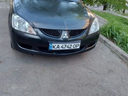 Міцубісі Lancer 2004 у Києві на Automoto.ua Сірий Міцубісі Lancer, об'ємом двигуна 1.6 л та пробігом 317 тис. км за 3600 $, фото 1 на Automoto.ua