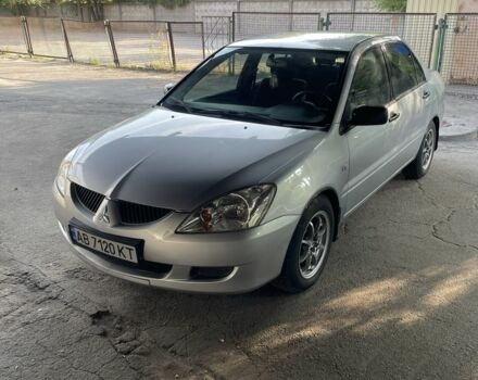 Сірий Міцубісі Lancer, об'ємом двигуна 1.6 л та пробігом 214 тис. км за 3700 $, фото 1 на Automoto.ua