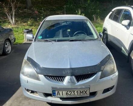 Сірий Міцубісі Lancer, об'ємом двигуна 1.58 л та пробігом 210 тис. км за 3500 $, фото 1 на Automoto.ua