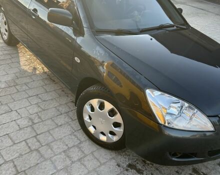 Серый Мицубиси Лансер, объемом двигателя 1.6 л и пробегом 286 тыс. км за 3200 $, фото 1 на Automoto.ua