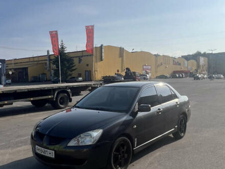 Мицубиси Лансер 2004 в Житомире на Automoto.ua Серый Мицубиси Лансер, объемом двигателя 1.58 л и пробегом 264 тыс. км за 4099 $, фото 1 на Automoto.ua