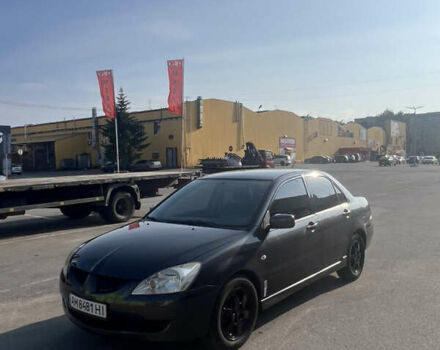 Сірий Міцубісі Lancer, об'ємом двигуна 1.58 л та пробігом 264 тис. км за 4099 $, фото 1 на Automoto.ua