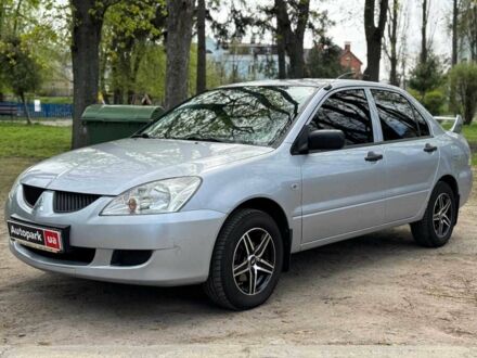 Міцубісі Lancer 2004 у Києві на Automoto.ua Сірий Міцубісі Lancer, об'ємом двигуна 1.3 л та пробігом 189 тис. км за 4190 $, фото 1 на Automoto.ua