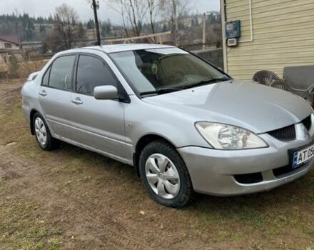 Сірий Міцубісі Lancer, об'ємом двигуна 1.59 л та пробігом 176 тис. км за 2800 $, фото 1 на Automoto.ua