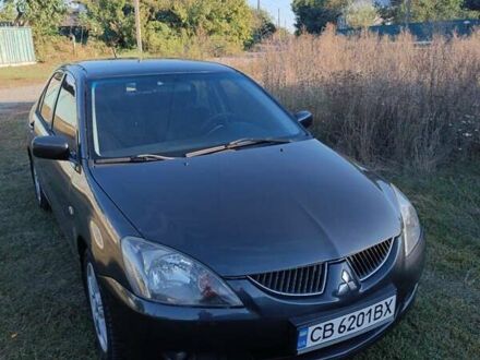 Сірий Міцубісі Lancer, об'ємом двигуна 2 л та пробігом 280 тис. км за 6000 $, фото 1 на Automoto.ua