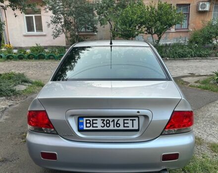 Сірий Міцубісі Lancer, об'ємом двигуна 1.6 л та пробігом 250 тис. км за 3757 $, фото 1 на Automoto.ua