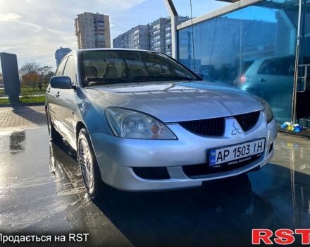 Серый Мицубиси Лансер, объемом двигателя 1.3 л и пробегом 376 тыс. км за 3700 $, фото 1 на Automoto.ua