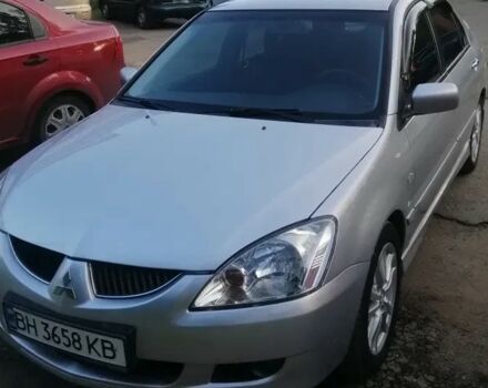 Сірий Міцубісі Lancer, об'ємом двигуна 2 л та пробігом 304 тис. км за 5000 $, фото 1 на Automoto.ua