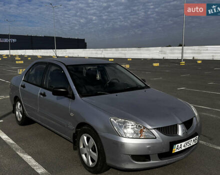 Сірий Міцубісі Lancer, об'ємом двигуна 1.58 л та пробігом 237 тис. км за 4500 $, фото 1 на Automoto.ua