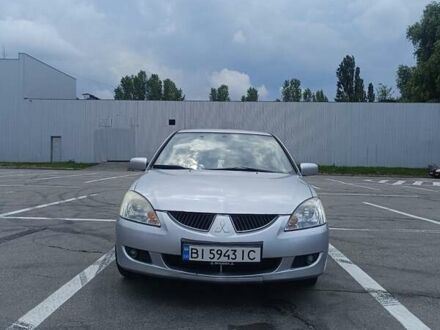 Сірий Міцубісі Lancer, об'ємом двигуна 1.6 л та пробігом 242 тис. км за 4300 $, фото 1 на Automoto.ua