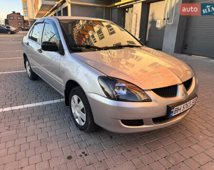 Серый Мицубиси Лансер, объемом двигателя 1.3 л и пробегом 450 тыс. км за 2800 $, фото 1 на Automoto.ua