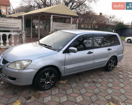 Серый Мицубиси Лансер, объемом двигателя 1.58 л и пробегом 240 тыс. км за 3500 $, фото 1 на Automoto.ua