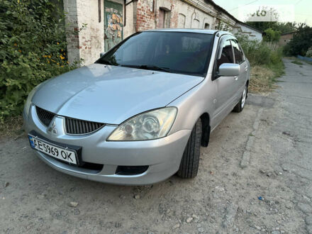 Сірий Міцубісі Lancer, об'ємом двигуна 1.3 л та пробігом 308 тис. км за 3600 $, фото 1 на Automoto.ua