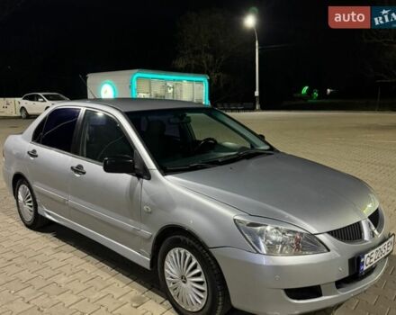 Серый Мицубиси Лансер, объемом двигателя 1.6 л и пробегом 460 тыс. км за 3333 $, фото 1 на Automoto.ua