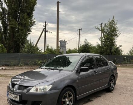 Сірий Міцубісі Lancer, об'ємом двигуна 1.6 л та пробігом 220 тис. км за 3800 $, фото 1 на Automoto.ua