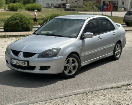 Сірий Міцубісі Lancer, об'ємом двигуна 2 л та пробігом 200 тис. км за 3550 $, фото 1 на Automoto.ua