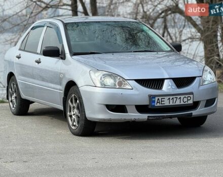 Сірий Міцубісі Lancer, об'ємом двигуна 1.3 л та пробігом 299 тис. км за 4200 $, фото 1 на Automoto.ua