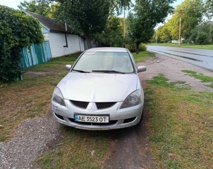 Сірий Міцубісі Lancer, об'ємом двигуна 2 л та пробігом 242 тис. км за 3600 $, фото 1 на Automoto.ua