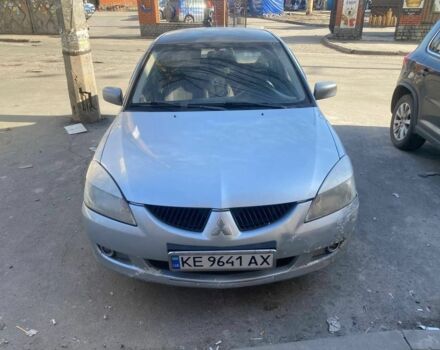 Сірий Міцубісі Lancer, об'ємом двигуна 1.6 л та пробігом 300 тис. км за 1353 $, фото 1 на Automoto.ua