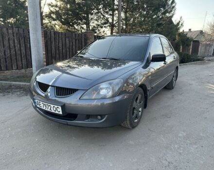 Серый Мицубиси Лансер, объемом двигателя 1.6 л и пробегом 270 тыс. км за 3950 $, фото 1 на Automoto.ua