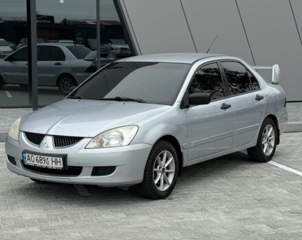 Сірий Міцубісі Lancer, об'ємом двигуна 1.6 л та пробігом 360 тис. км за 2400 $, фото 1 на Automoto.ua