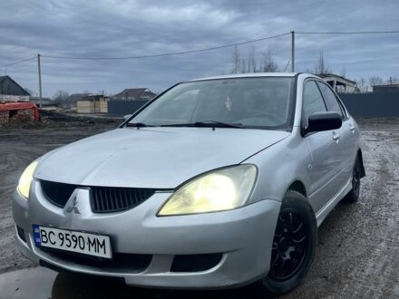 Сірий Міцубісі Lancer, об'ємом двигуна 1.6 л та пробігом 315 тис. км за 2950 $, фото 1 на Automoto.ua