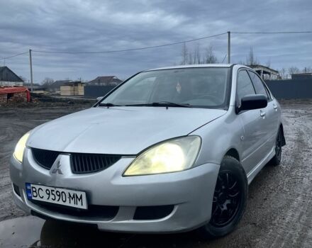 Серый Мицубиси Лансер, объемом двигателя 1.6 л и пробегом 315 тыс. км за 2950 $, фото 1 на Automoto.ua