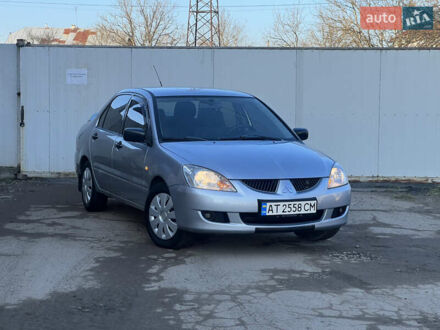 Сірий Міцубісі Lancer, об'ємом двигуна 1.6 л та пробігом 320 тис. км за 3650 $, фото 1 на Automoto.ua